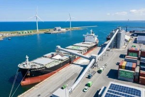 A bulk carrier ship loading sustainable urea fertilizers at an efficient, modern international port hub, representing optimized global supply chain logistics.